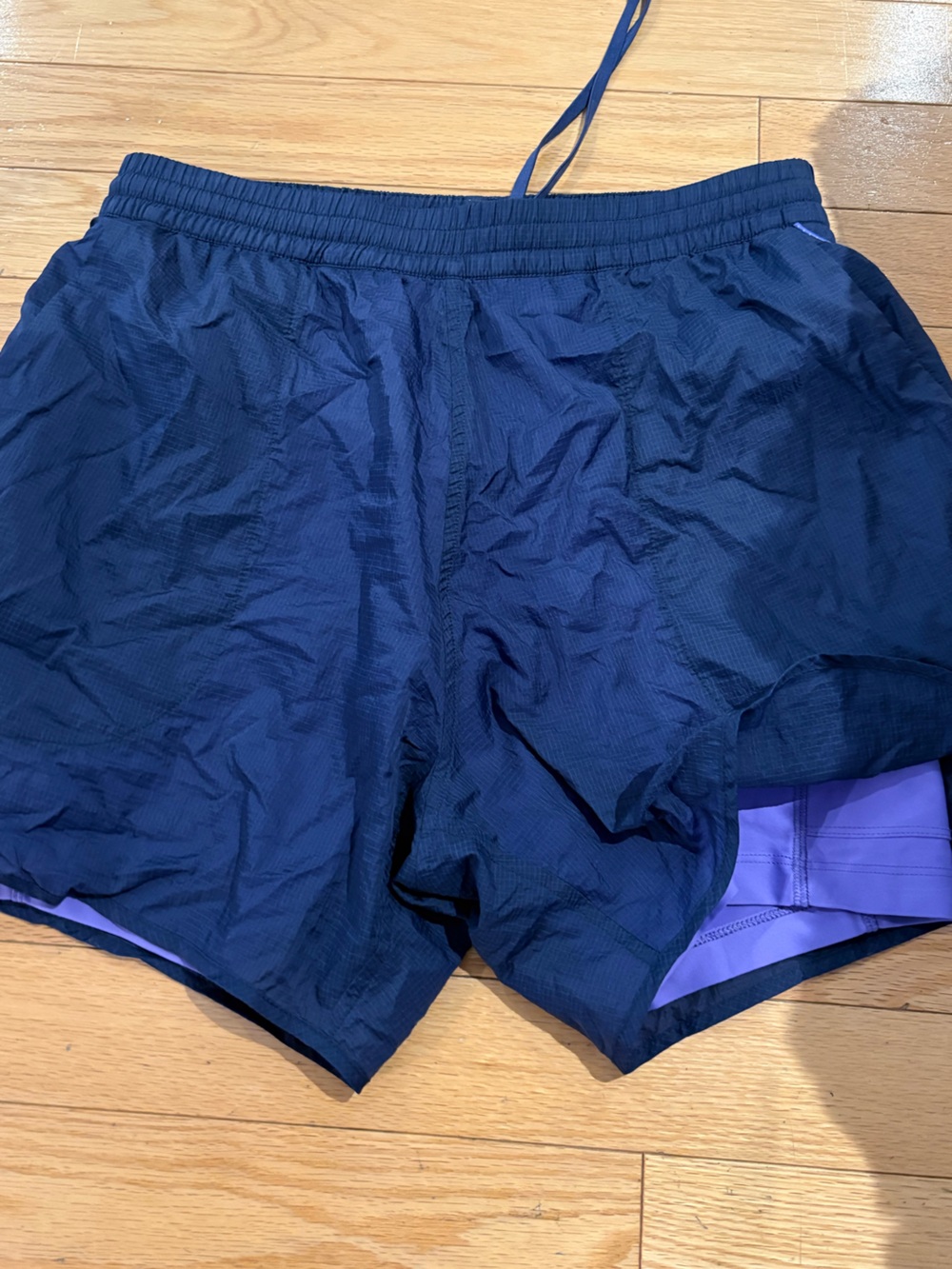 Outdoor Voices Navy Shorts with Purple Liner